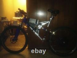 40mph Electric Mongoose 26 Inch Mountain Bike. 1500 watt motor. 52 volt nominal