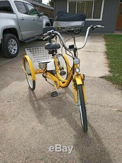 Yellow Electric tricycle 36 volts 450 watt. Rear wheel drive